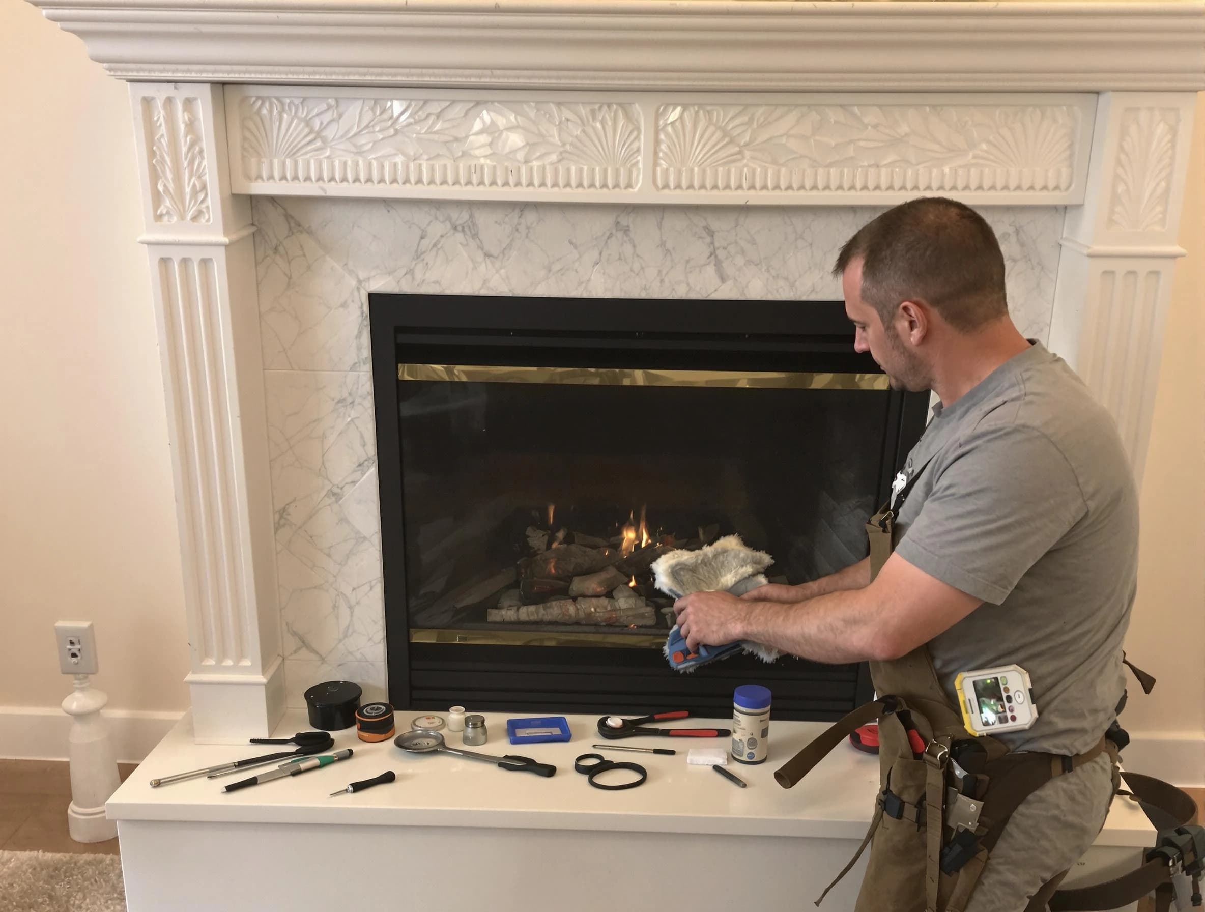 Wellsville Chimney Sweep performing fireplace maintenance in Wellsville, UT